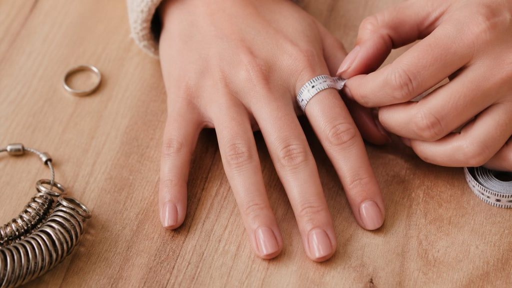 How do you measure ring size at home?